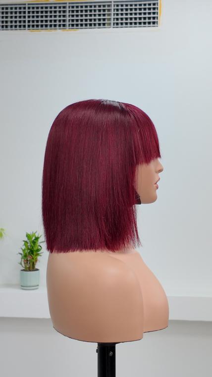 Side view of Worry Freeshop burgundy red straight bob wig with bangs