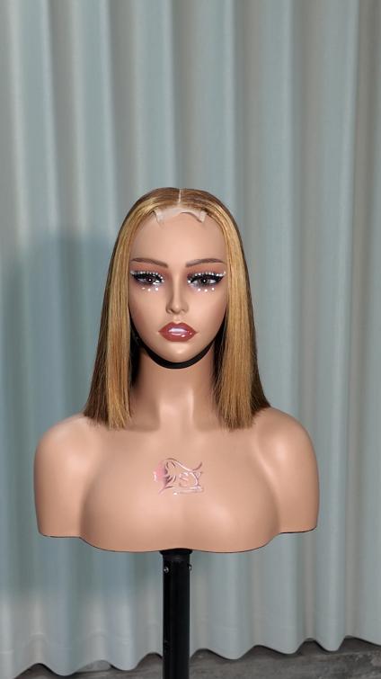 Front view of Worry Freeshop 10 inch brown bob with blonde front highlight 2x6 lace human hair wig