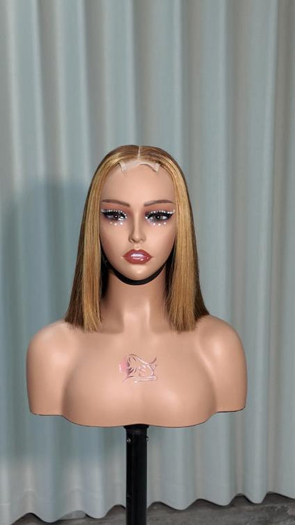Front view of Worry Freeshop 10 inch brown bob with blonde front highlight 2x6 lace human hair wig
