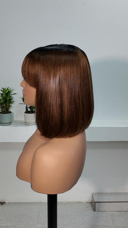 Side view of Worry Freeshop 10 inch dark root chestnut brown bob with bangs human hair wig