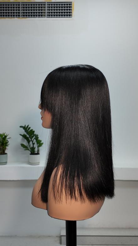 Side view of Worry Freeshop 14 inch straight human hair wig with bangs