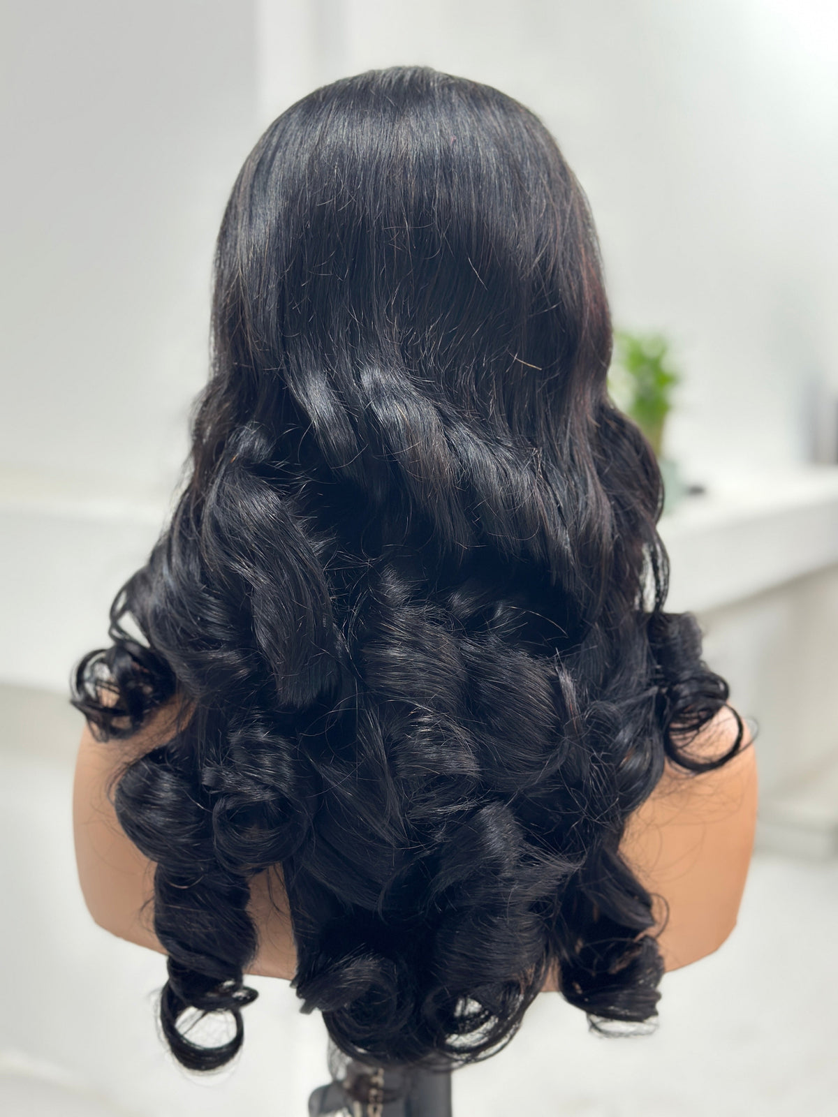 Back view of Worry Freeshop 22 inch natural black retro curl human hair wig