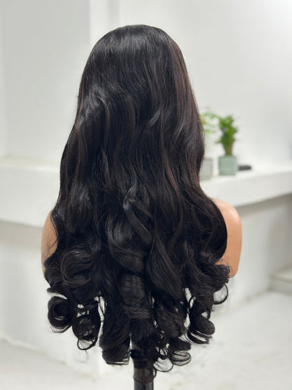 Back view showing long loose curls on Worry Freeshop 26 inch human hair wig