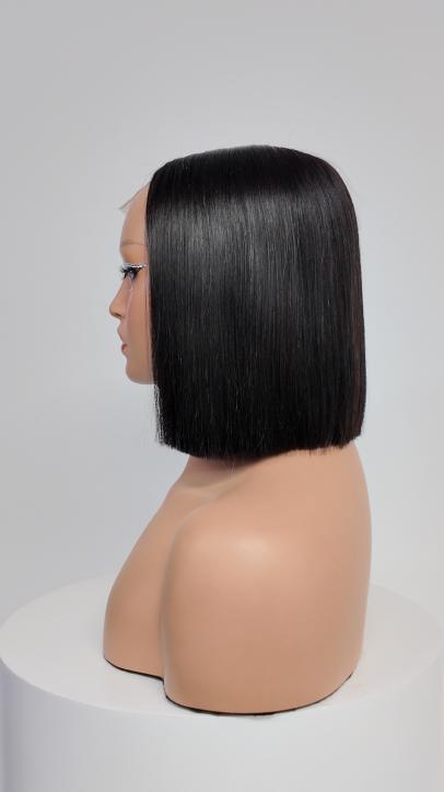 Side view of Worry Freeshop black straight blunt bob human hair lace wig