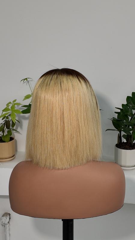 Back view of Worry Freeshop 8 inch dark root blonde 13x4 lace bob human hair wig