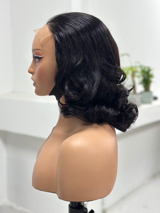 Side view of Worry Freeshop natural black retro curl 5x5 lace human hair wig