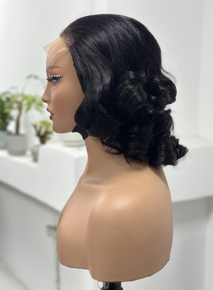 Side view of natural black vintage loose curl 5x5 lace wig