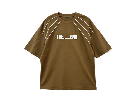 Brown relaxed-fit T-shirt with white contrast piping and chest slogan graphic