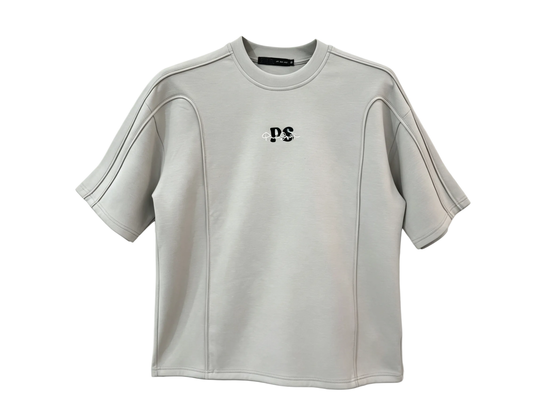 Light gray relaxed-fit T-shirt with raised piping and curved panel seams