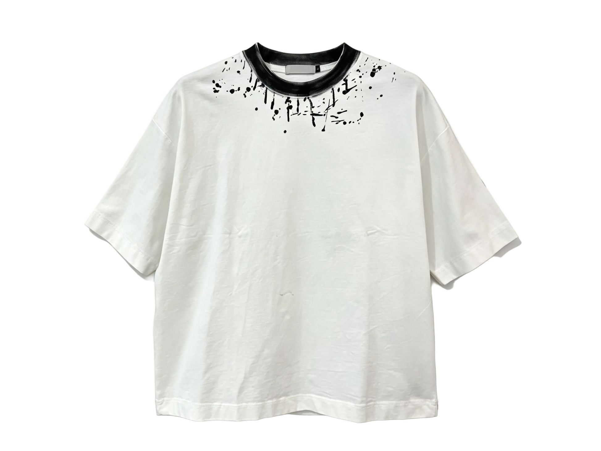 White relaxed-fit T-shirt with black contrast collar and paint splatter print