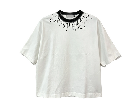White relaxed-fit T-shirt with black contrast collar and paint splatter print